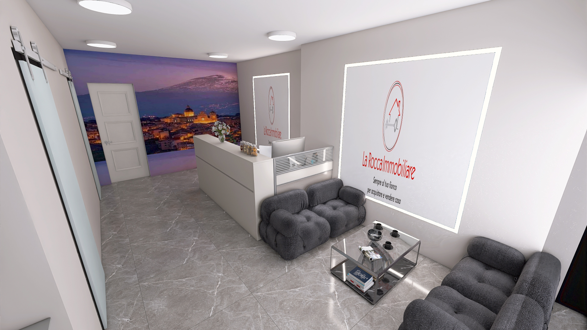 Reception e area accoglienza dell'agenzia immobiliare La Rocca con bancone su misura, parete brandizzata e poltrone imbottite